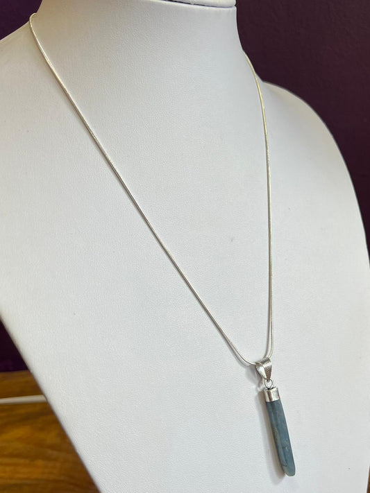 Raw kyanite on silver placed necklace